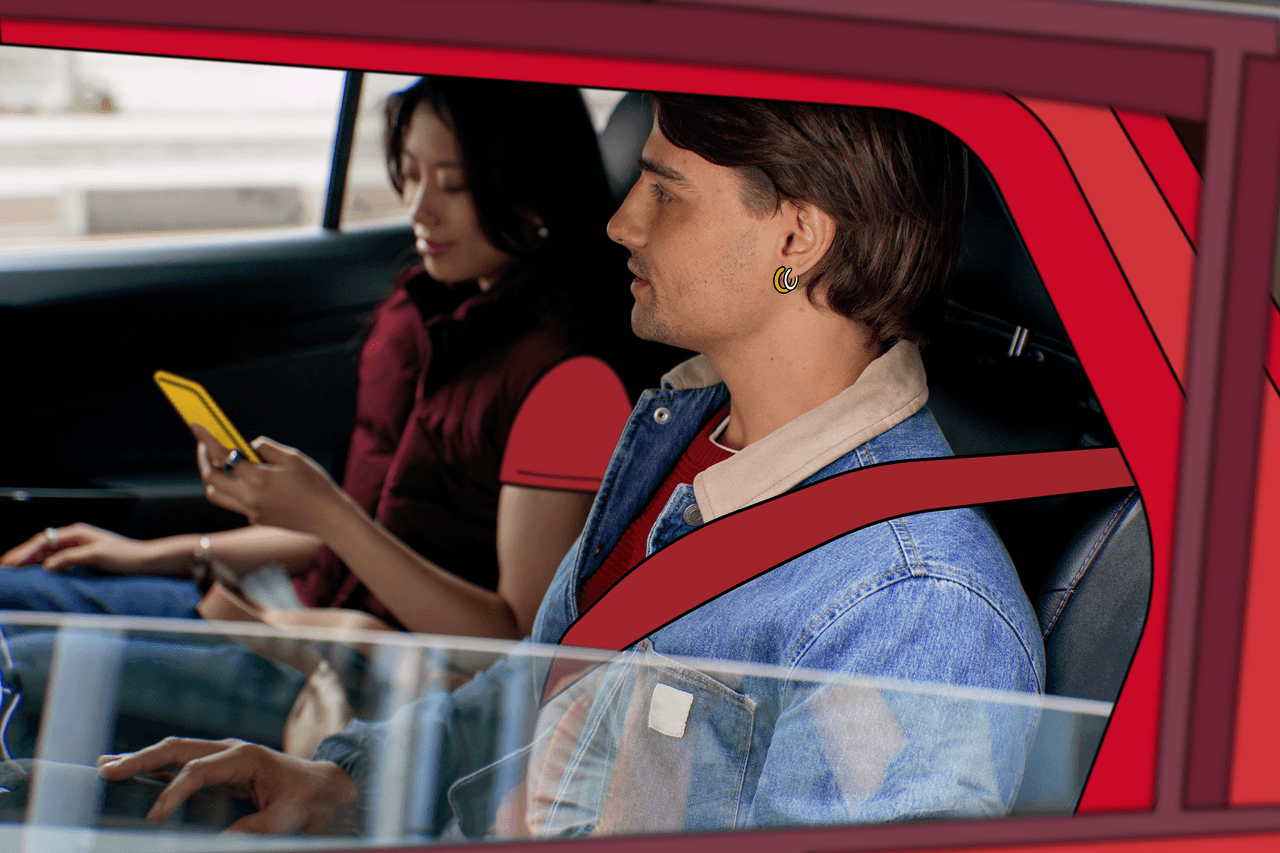 employees in the back of a business taxi