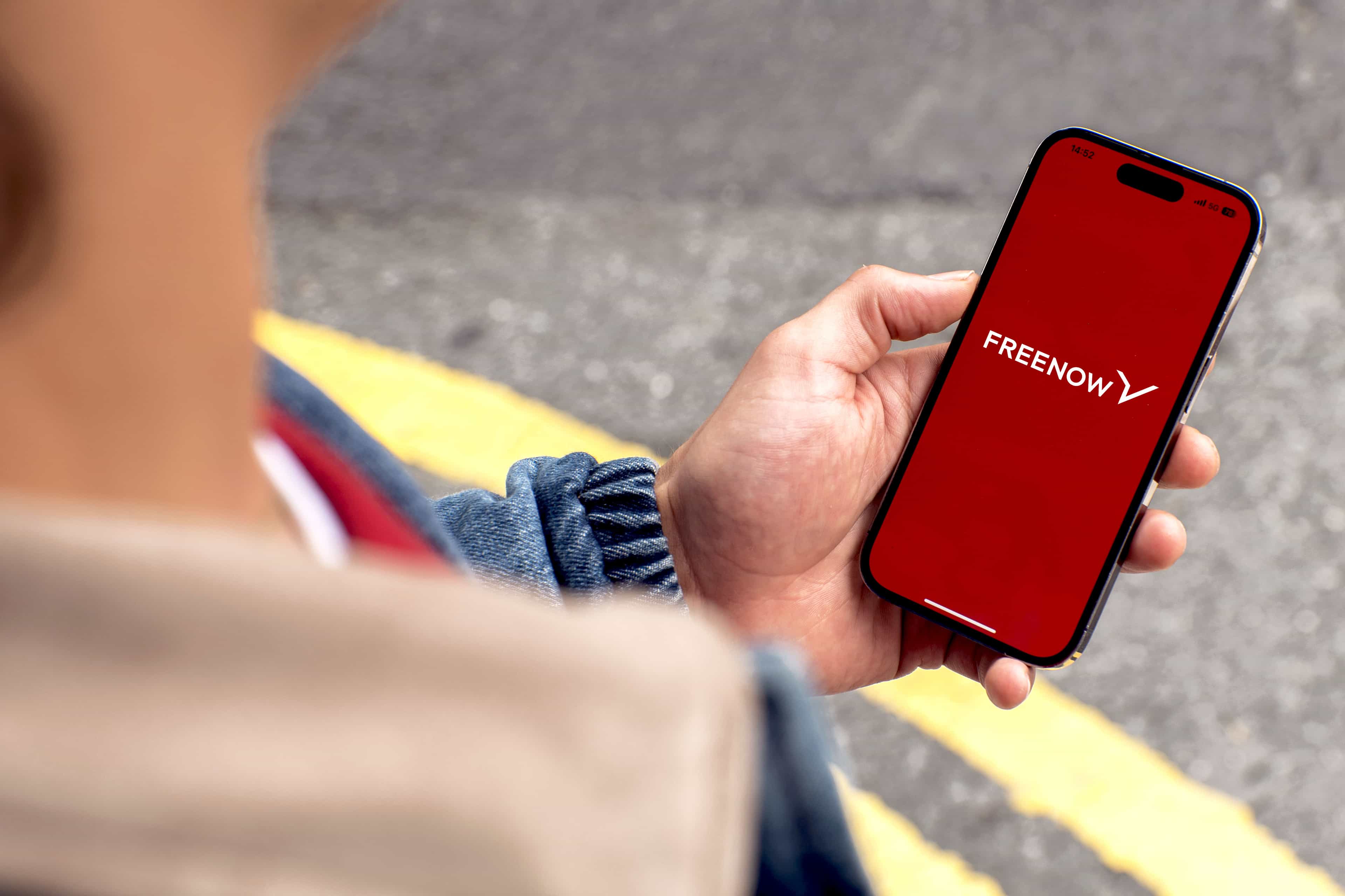 woman holding phone